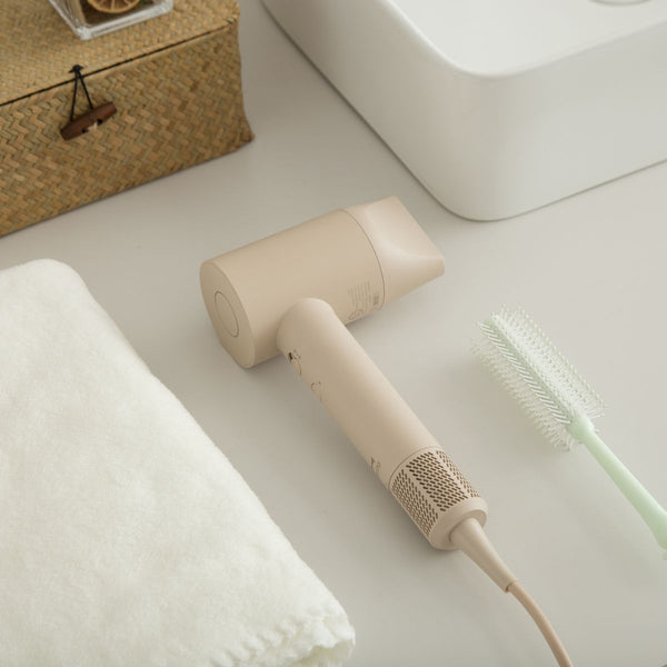 BRUNO BAK811 hair dryer placed beside a hairbrush