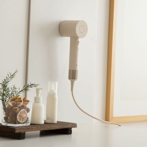 BRUNO BAK811 hair dryer on its magnetic wall mount